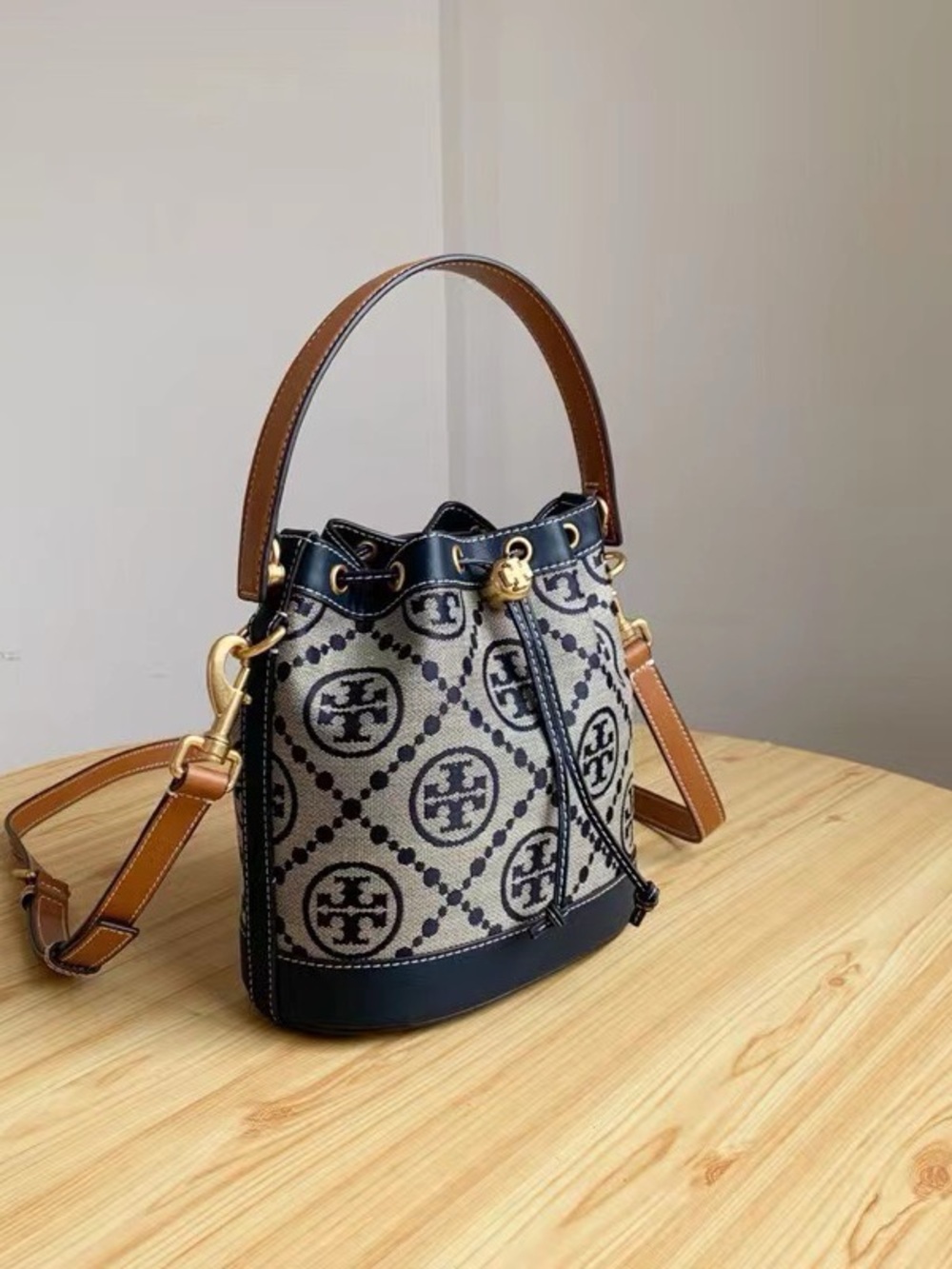 Tory Burch Navy and Tan Logo Drawstring Bucket Bag - Picture 2 of 5